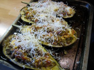 Aubergines stuffed and ready to go in the oven
