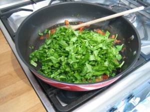 Add roughly chopped spinach